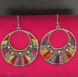 Intricately carved boho earrings Vibrant ropes Sparkling rhinestones